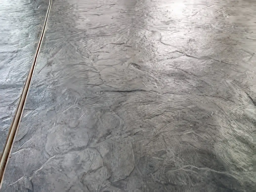 smooth slate stamped concrete finished example